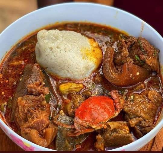 Banku with authentic okra stew/fresh salmon/beef/assorted meats 