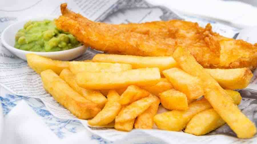 Fries with golden fried fish 