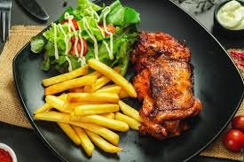 Grill chicken with chips and salad.