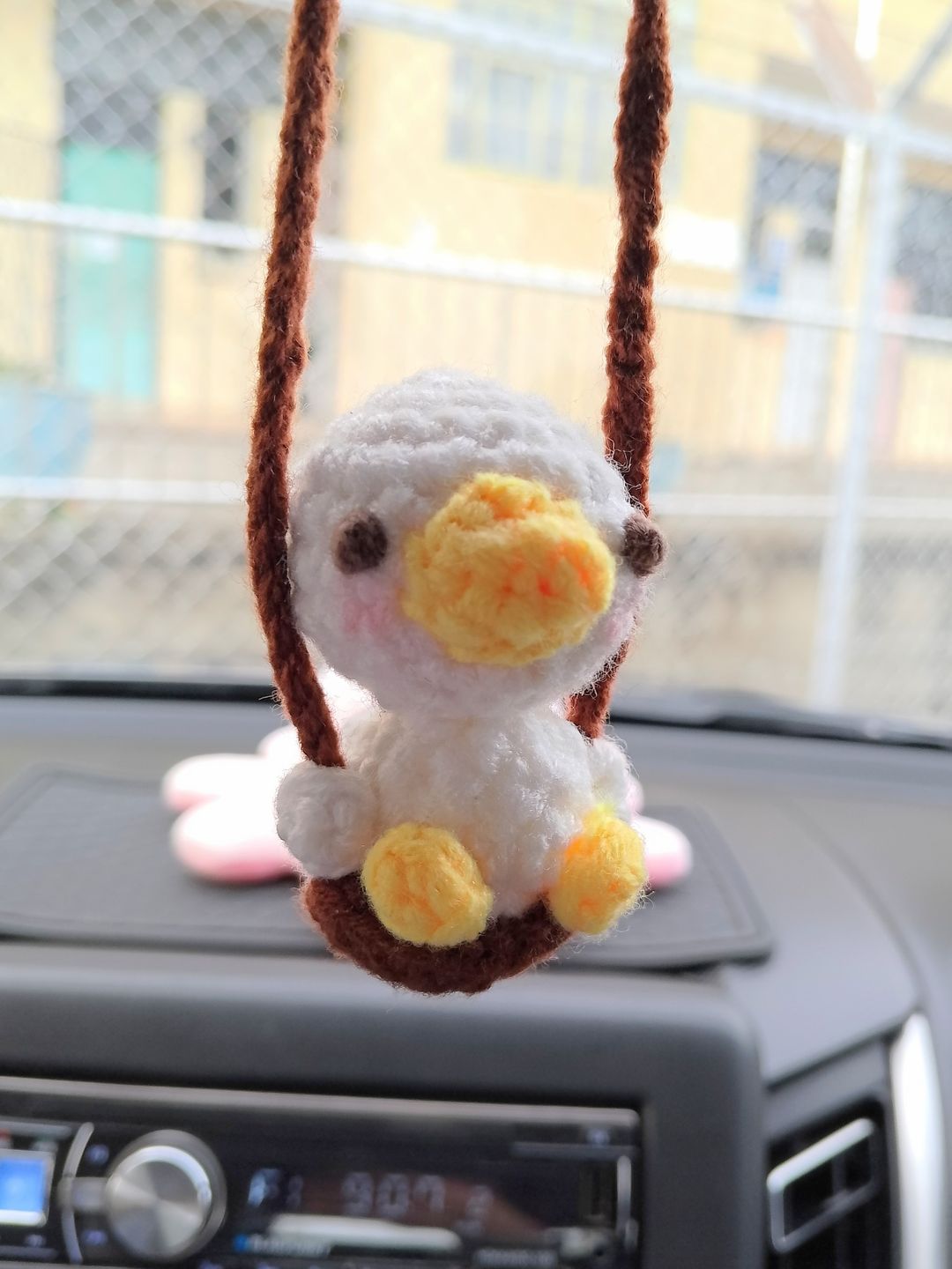 Swinging duckling car ornament 