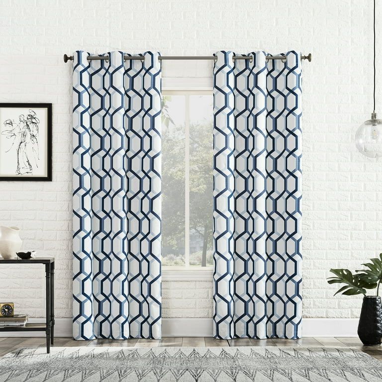 Pair of geometric blackout curtains 