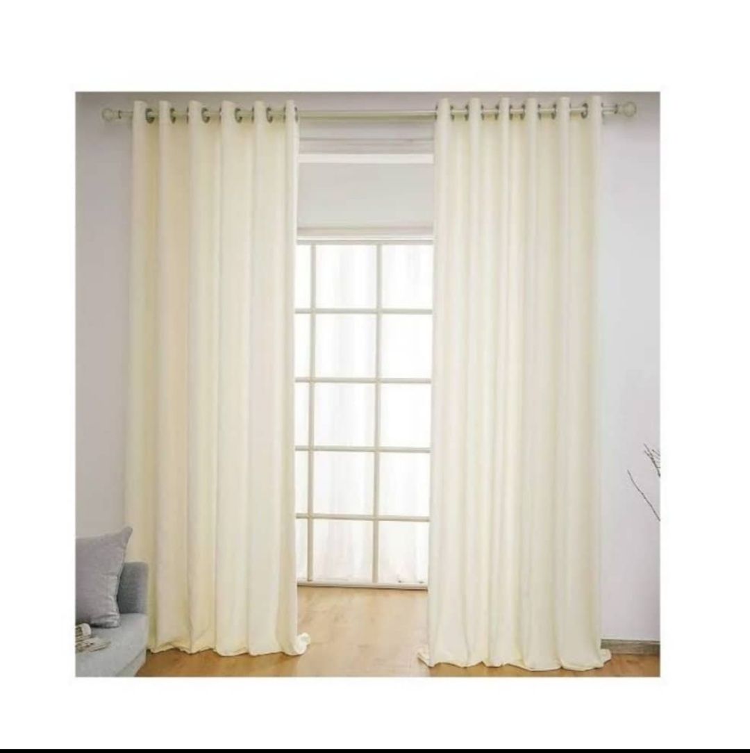 a pair of cream curtain nets (2*2.5)m