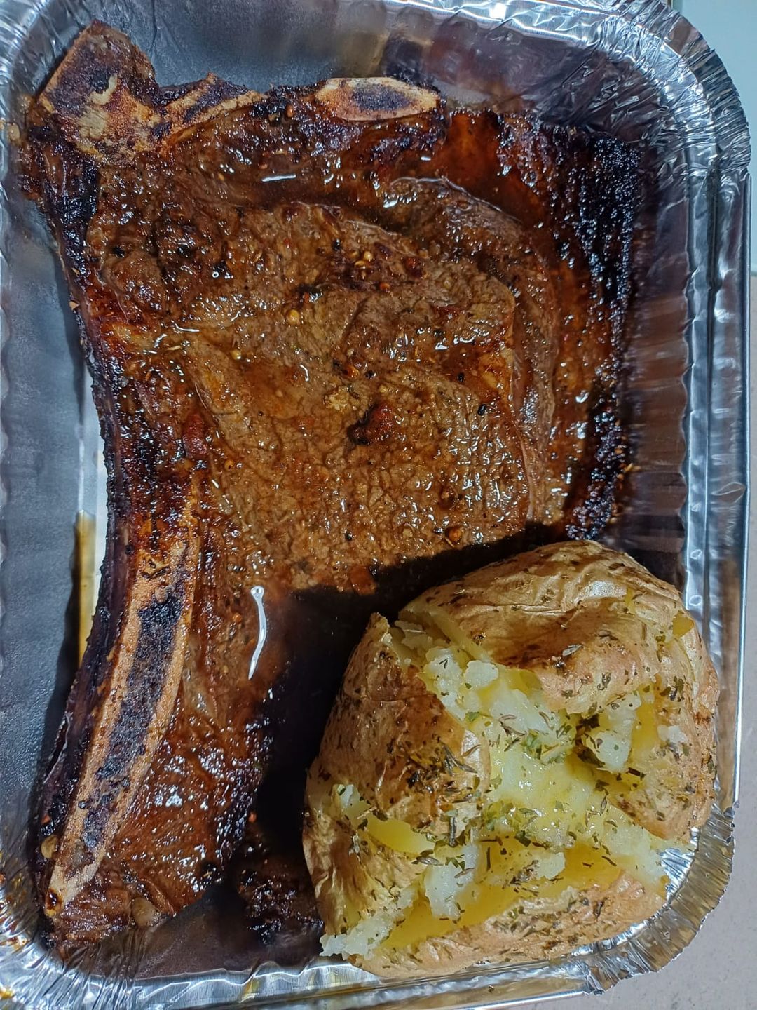 T-Bone steak + baked potato 