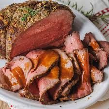 Roast Sirloin with Roast Potatoes and Creamed Spinach