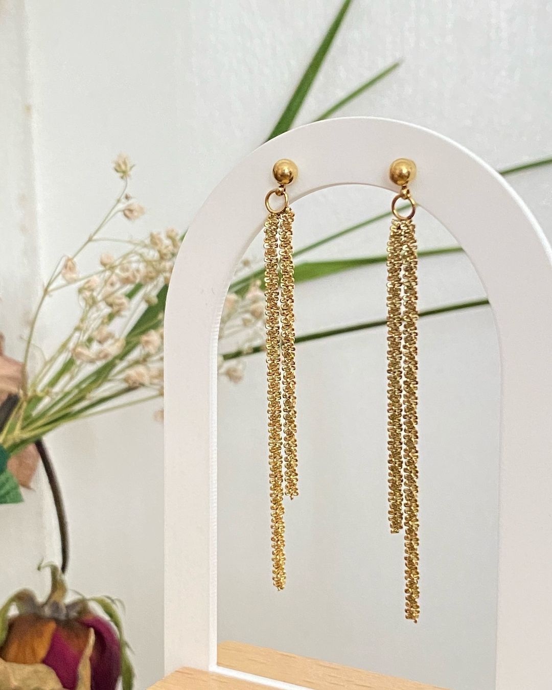 Dangly stud earrings
