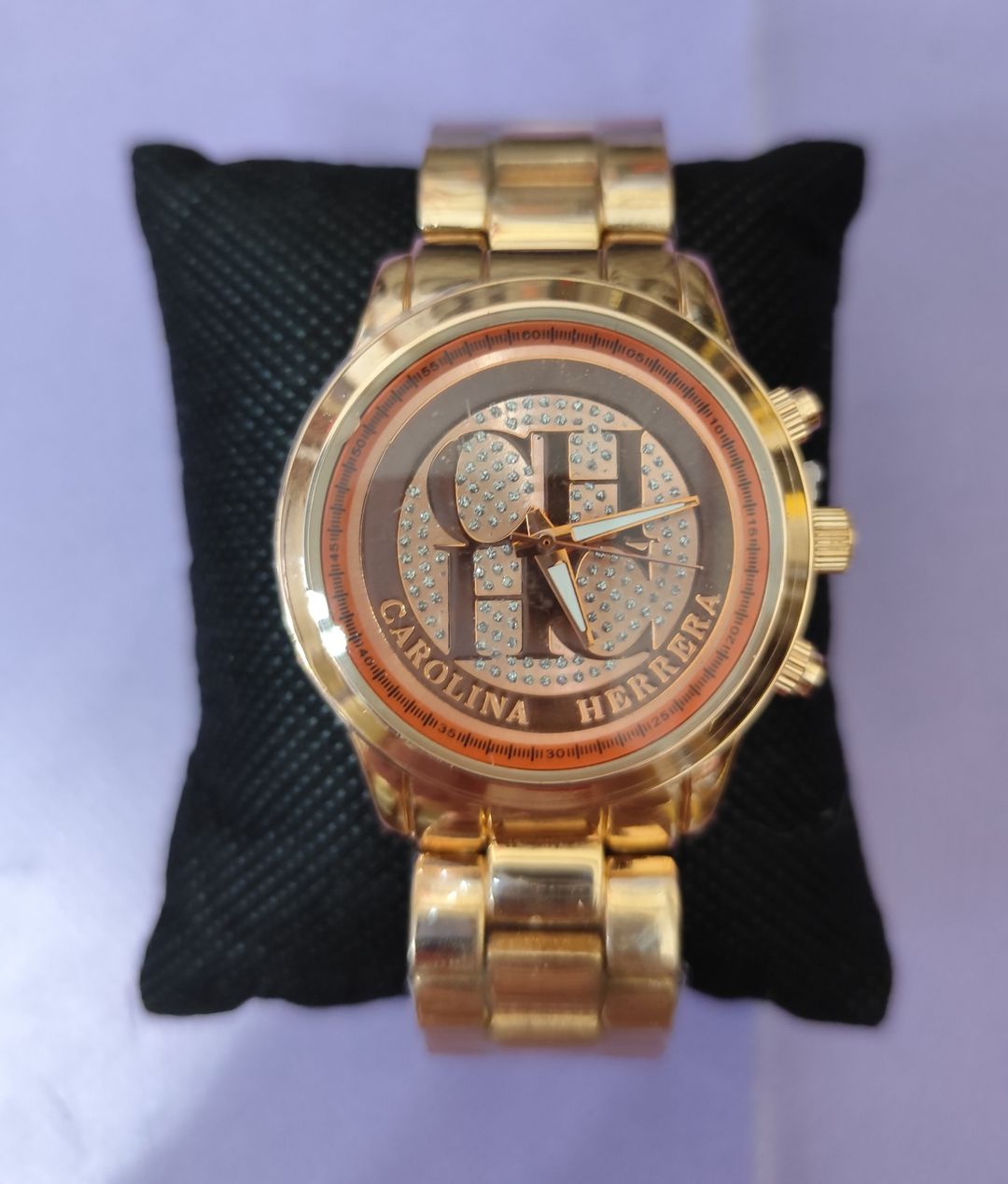 Reloj CH, color oro rosa
