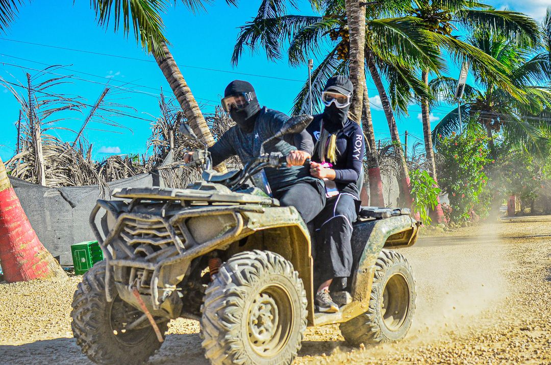 { ATV TOUR for 2 riders per ATV }  Get ready for a wild ride! You'll drive your own buggy through muddy trails, explore a hidden cave, visit a traditional Dominican house for local tastings (like coffee, cacao & mamajuana), and finish off with a swim at the stunning Macao Beach. Adventure, culture, and fun—all in one tour!