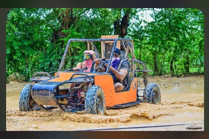 { Double buggy for 2 drivers }Get ready for a wild ride! You'll drive your own buggy through muddy trails, explore a hidden cave, visit a traditional Dominican house for local tastings (like coffee, cacao & mamajuana), and finish off with a swim at the stunning Macao Beach. Adventure, culture, and fun—all in one tour!