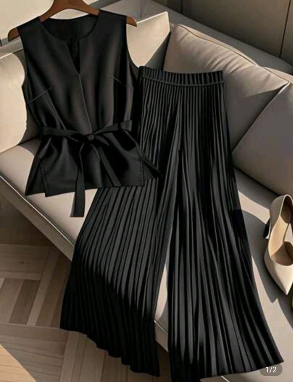 طقم نسائي أنيق باللون الأسود (3500دج)_($25)