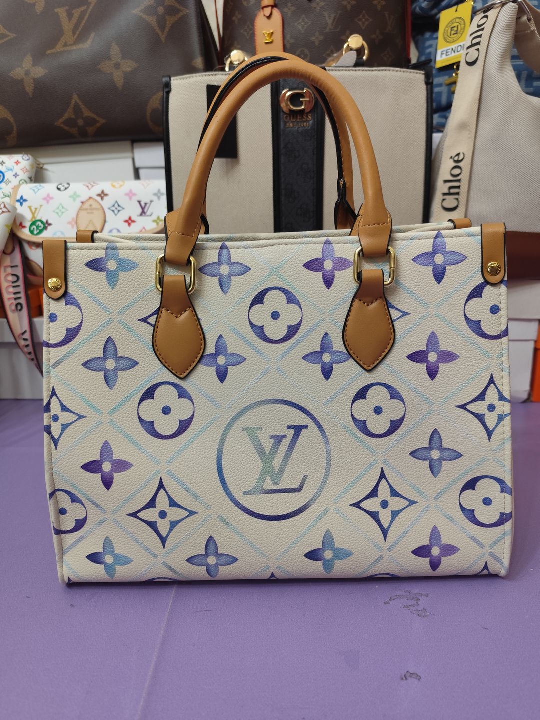 Bolsos LV, onthego mediano, blanco y azul