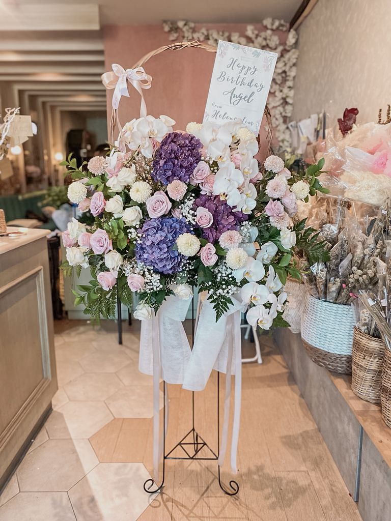 Signature standing flower