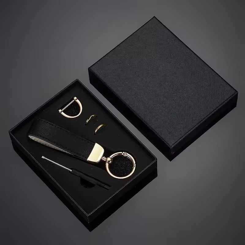 Porte-clé en véritable cuir pour hommes et femmes
