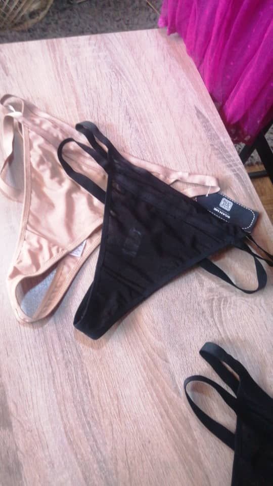 Beige and black thong with bra strips