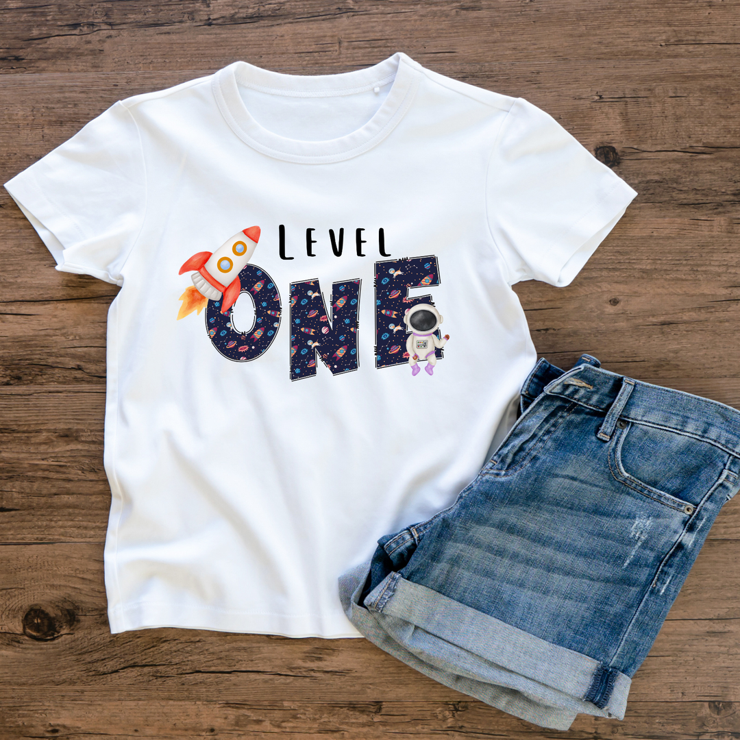 "Level One" Space Birthday T-Shirt – Rocket & Astronaut First Birthday Tee
