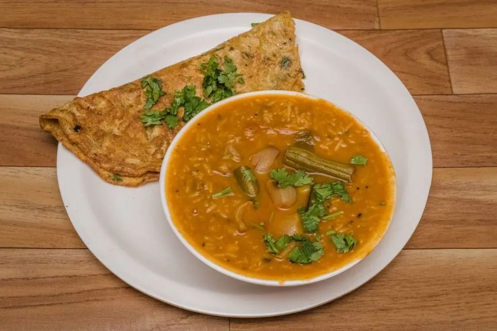Sambar Rice + Double Omlette