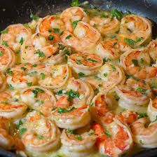 Gambas à la crème fraîche et aux champignons