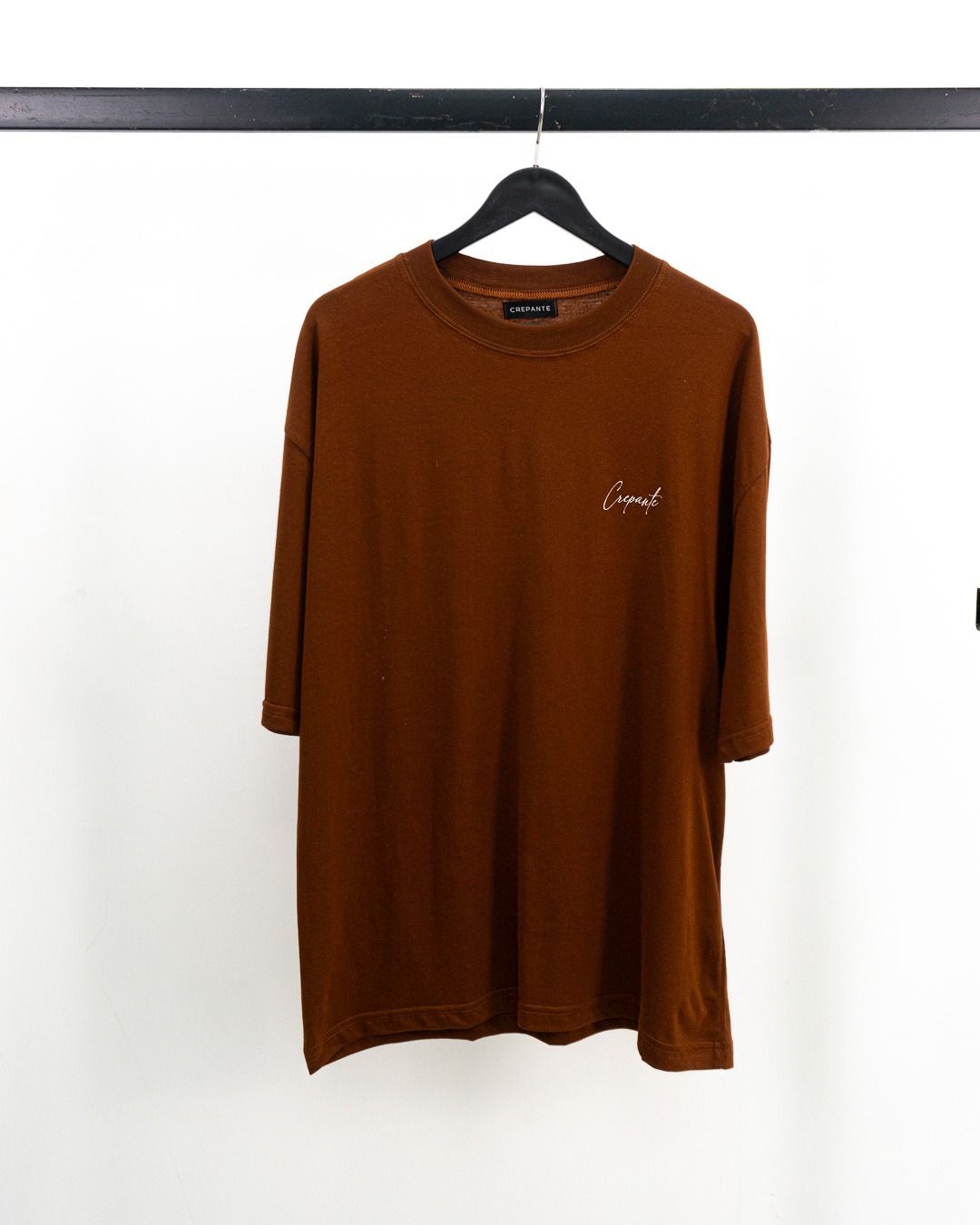 polo oversize crepante marron