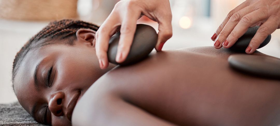 Massage aux pierres chaude