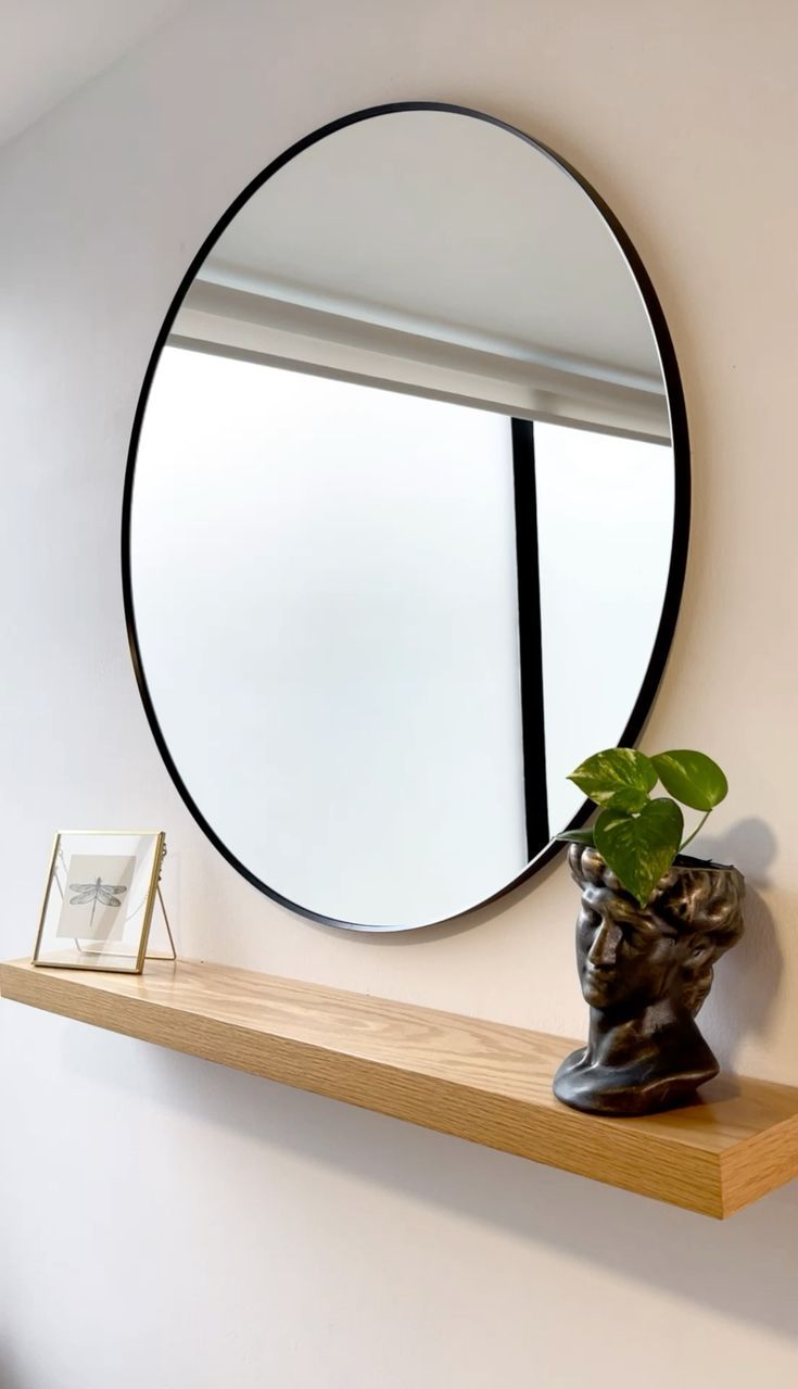 Miroir rond et étagère 