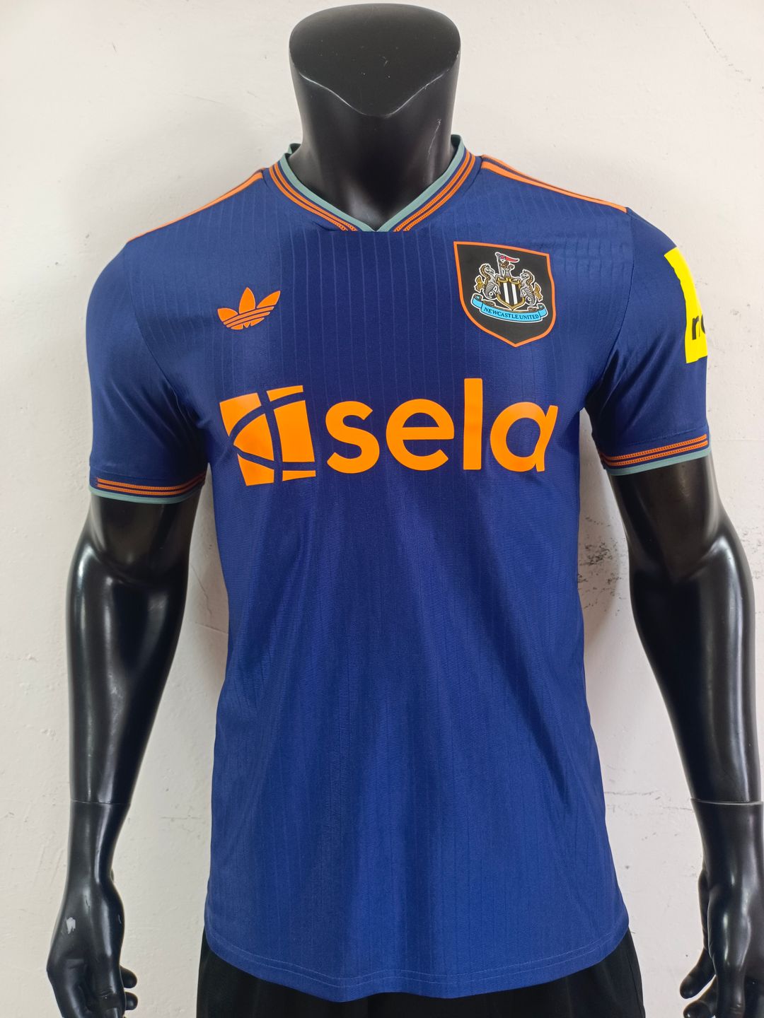 Newcastle United 2025/26 Third Shirt (Blue / Orange / Sky blue)