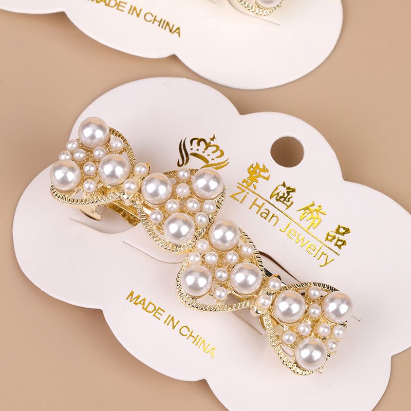 New pearl bow tie horizontal clip