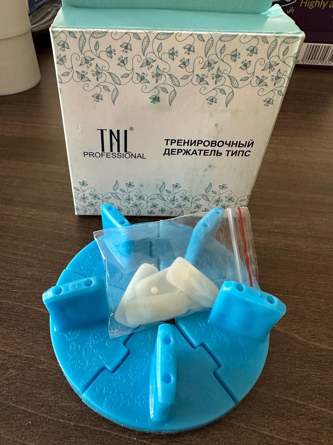 Training holder for tip 