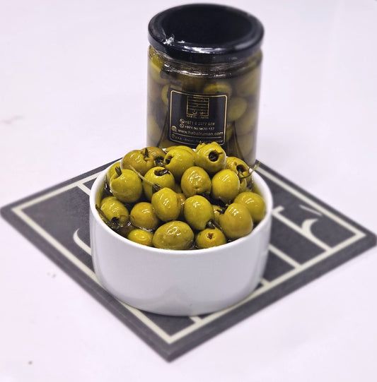 Green Olives Stuffed Thyme Without Salt Dipped In Olive Oil