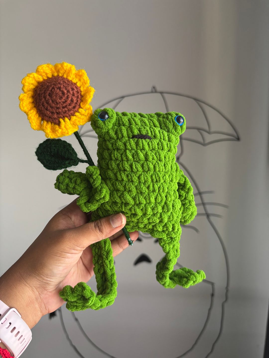 Leggy frog with sunflower