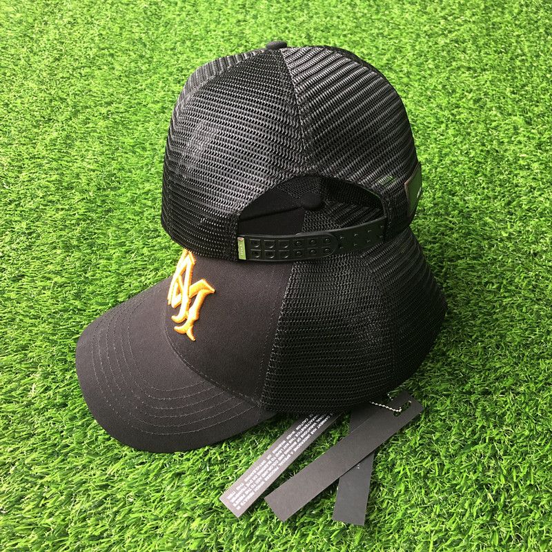 AMIRI CURVED PEAK BLACK AND YELLOW LOGO