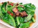 Stir fry kailan with crispy pork