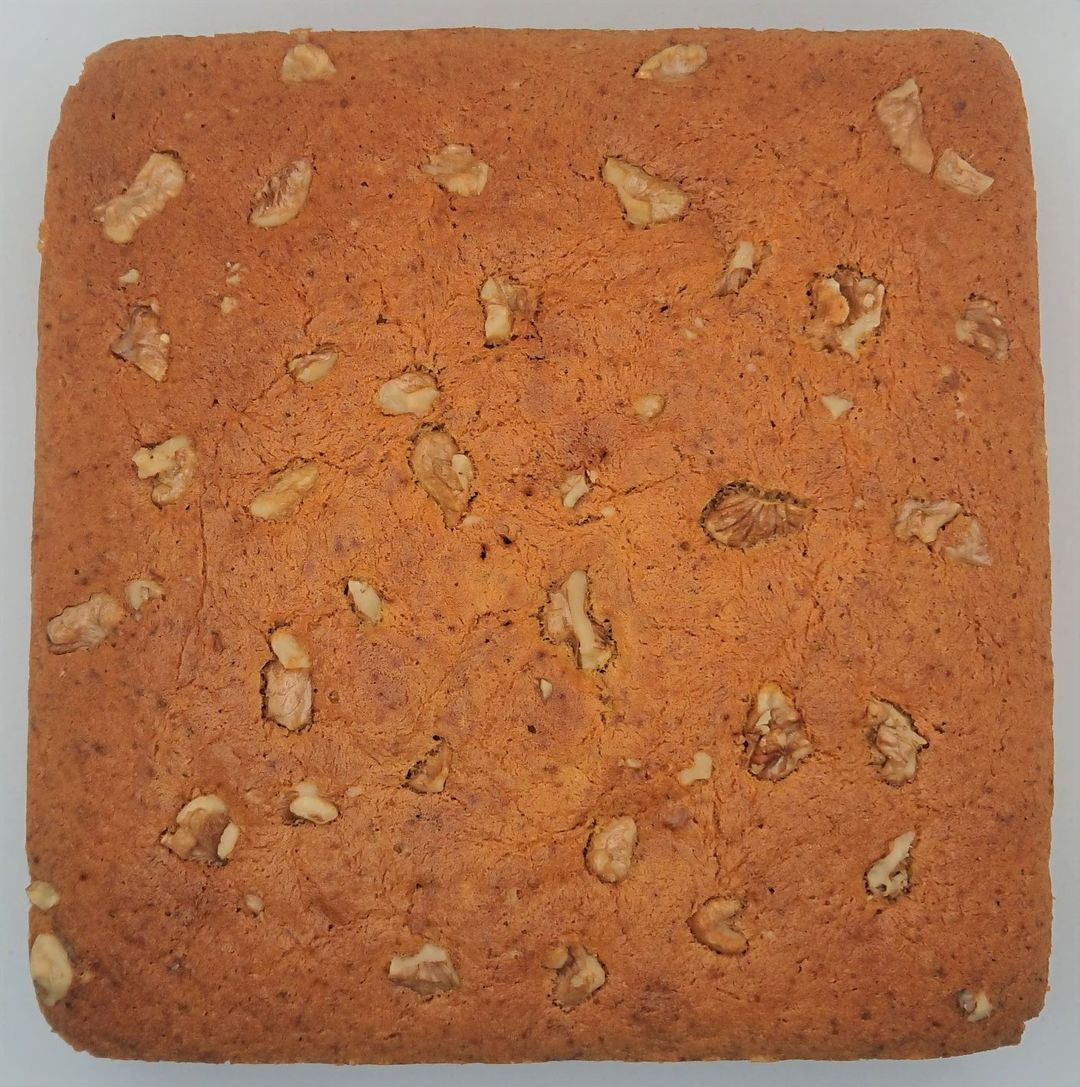 Banana cake topped with walnuts
