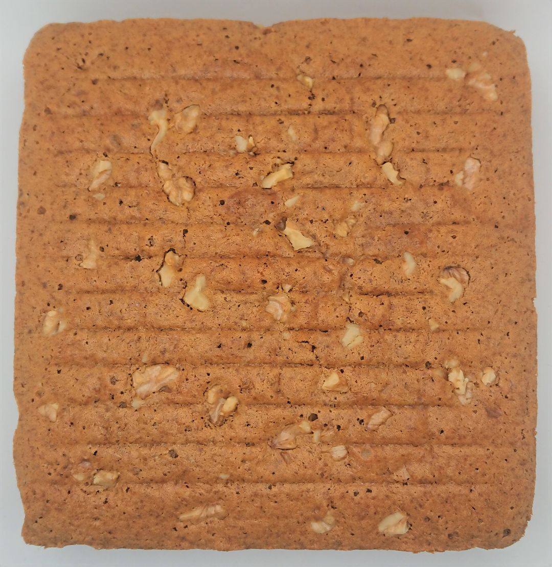 Coffee cake topped with walnuts