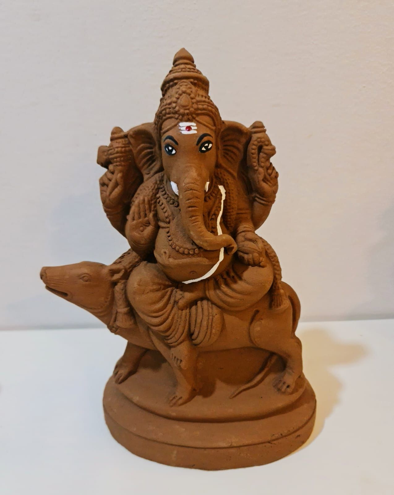 10 inches - Ganesha sitting on Mooshika Vahanam (Left/Right trunk)_1