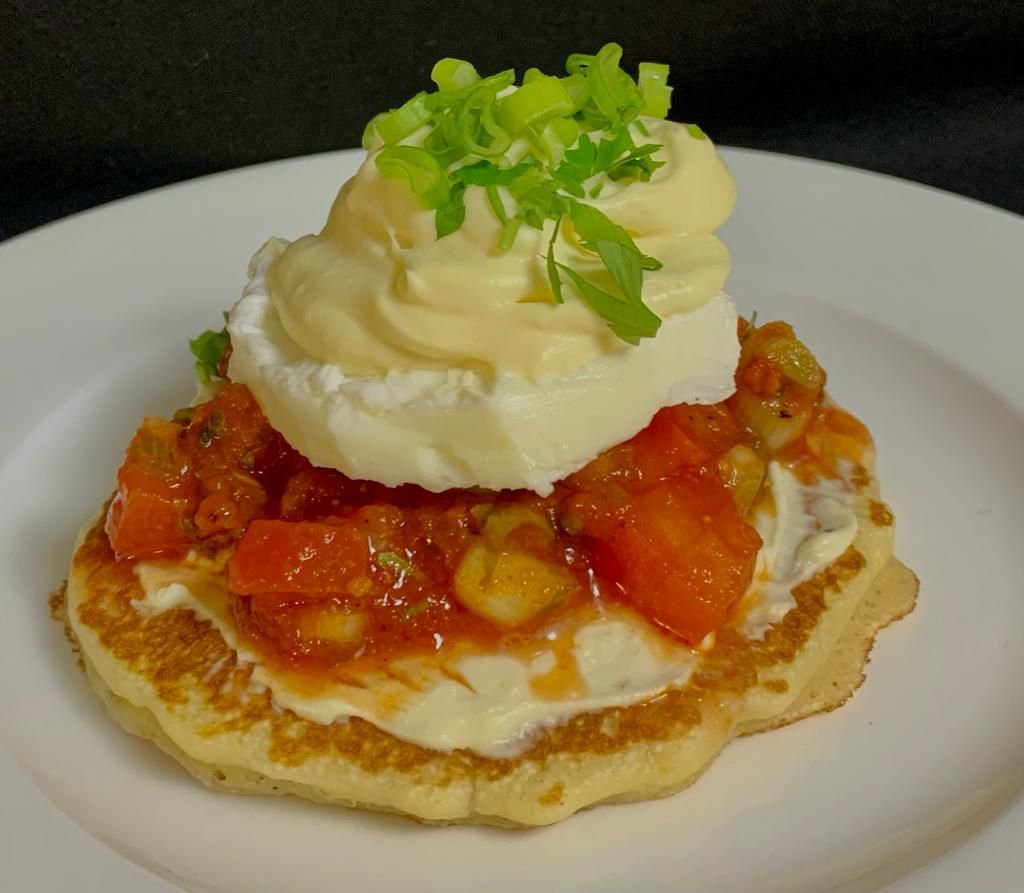 Moroccan Harcha with Poached Eggs, Spicy Tomato Sauce and Cream Cheese Spread_0