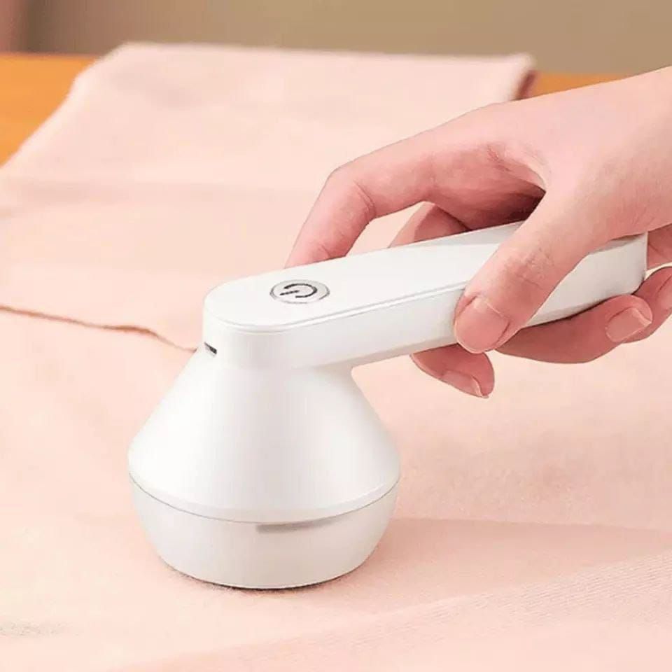 Rechargeable lint remover  Comes with extra blades and brush_3