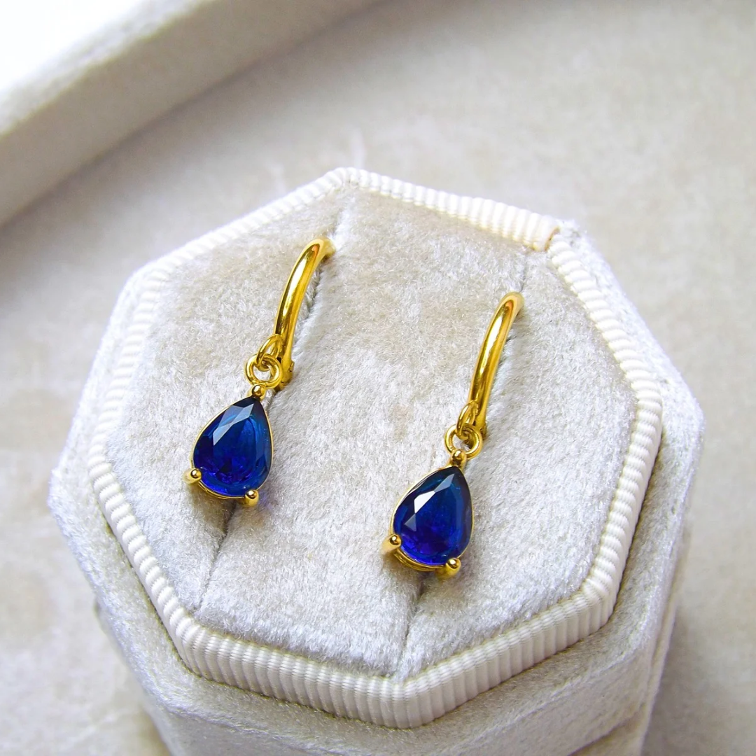 CRYSTAL TEAR HUGGIE (NAVY) 18k gold plated earrings _0