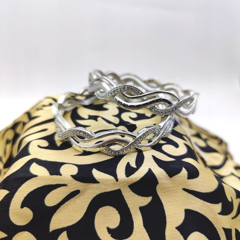 Silver leucrocotta bangles for women_2