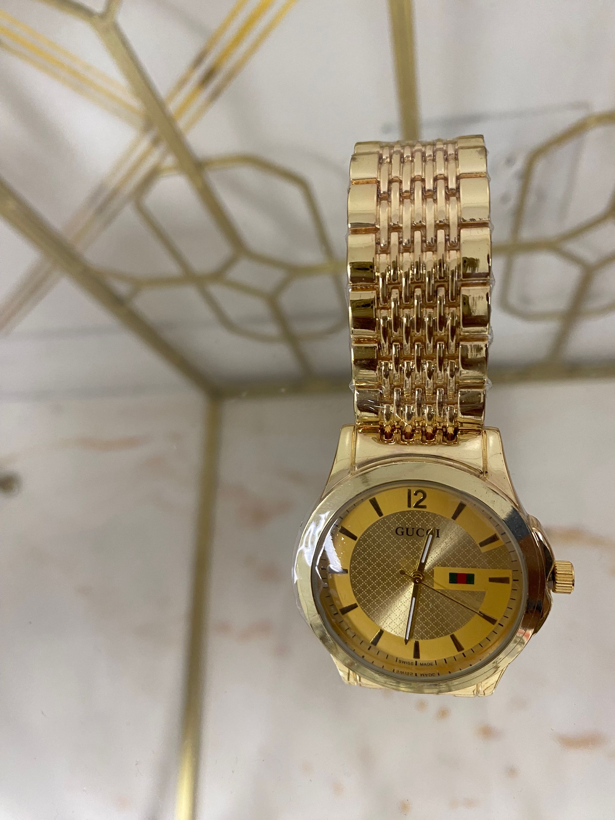 Gold Gucci Watch_0