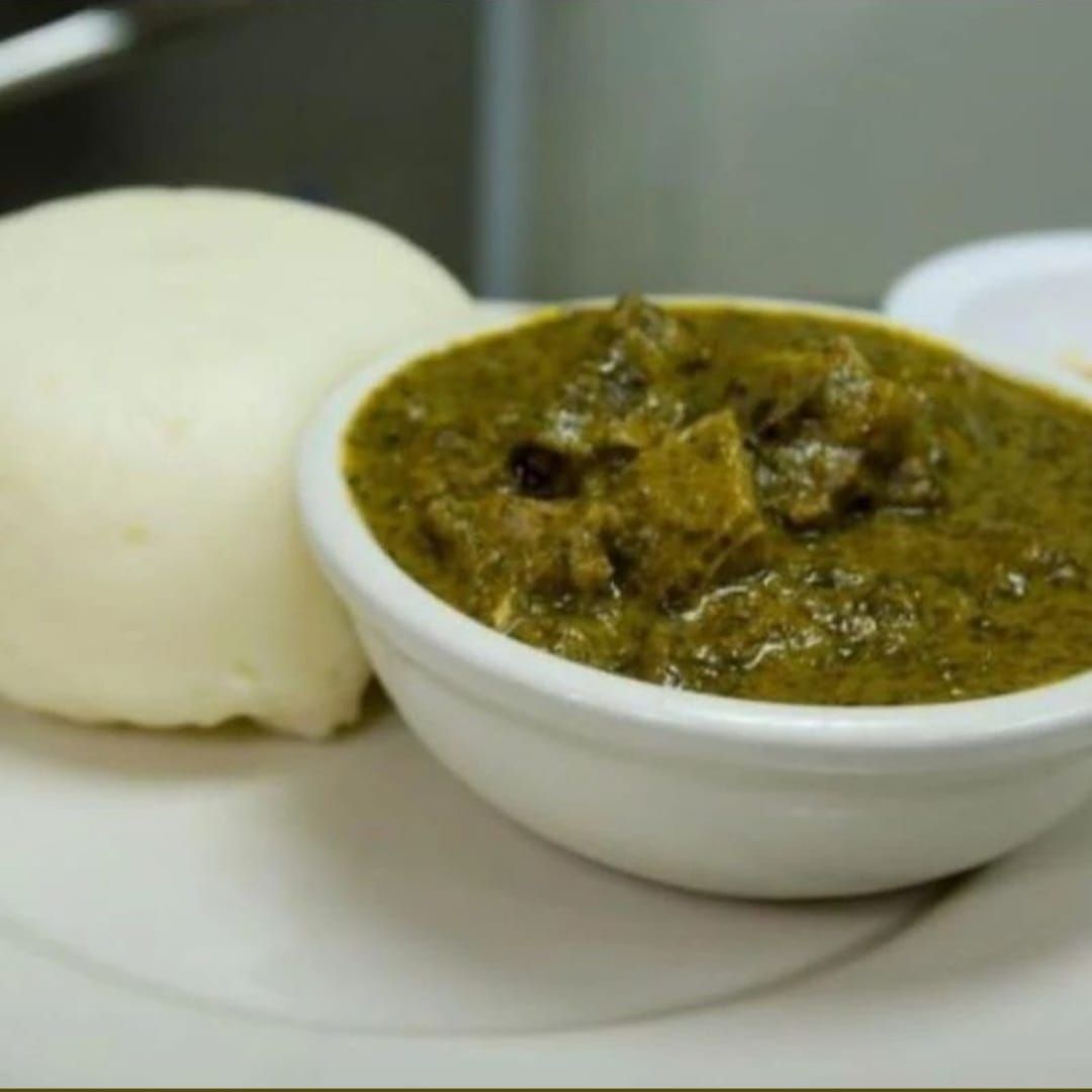 Rwandan Food Isombe with meat and ugali_0