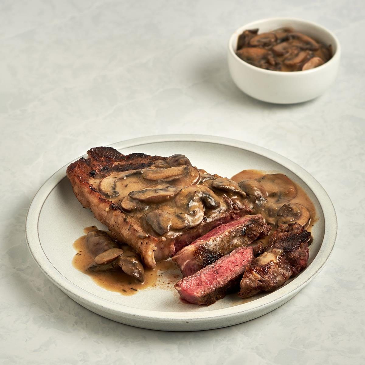 Tbone Steak Steak with Mushroom Sauce and Chips_0