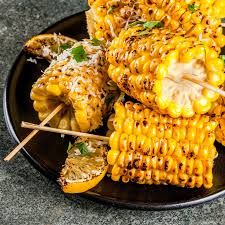 BARBE FRY CHICKEN & JERK CHICKEN SERVED WITH RICE & PEAS, CORN ON THE COB AND TOSS SALAD_2