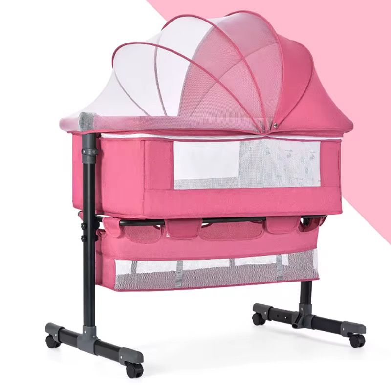 Baby besides crib bed _0