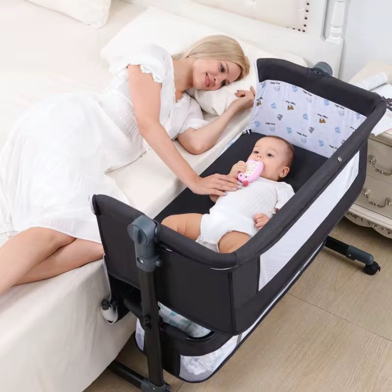 Baby besides crib bed _5