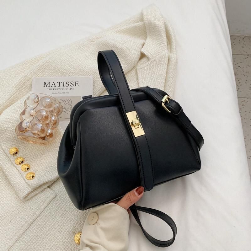 Leathered sling bags._0