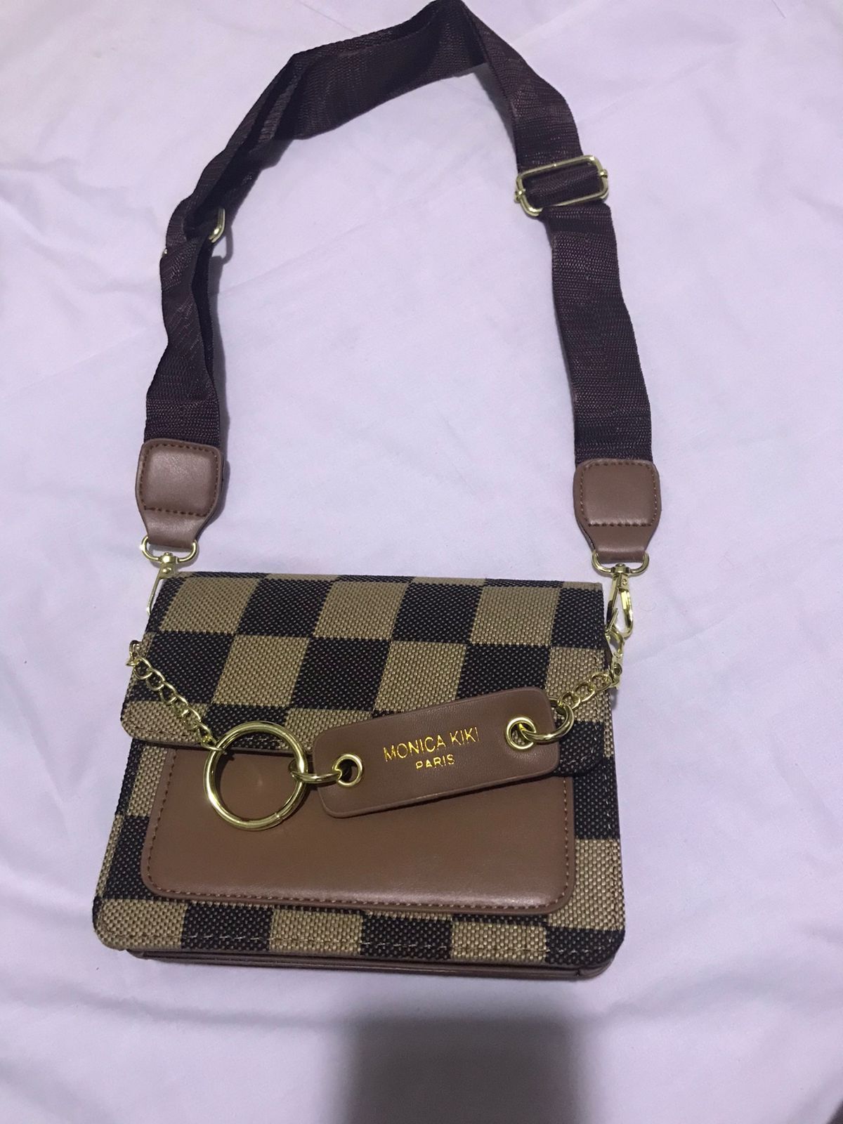 Geometric print sling bag._0