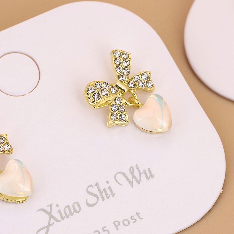 Fashion love pearl bow stud earrings_0