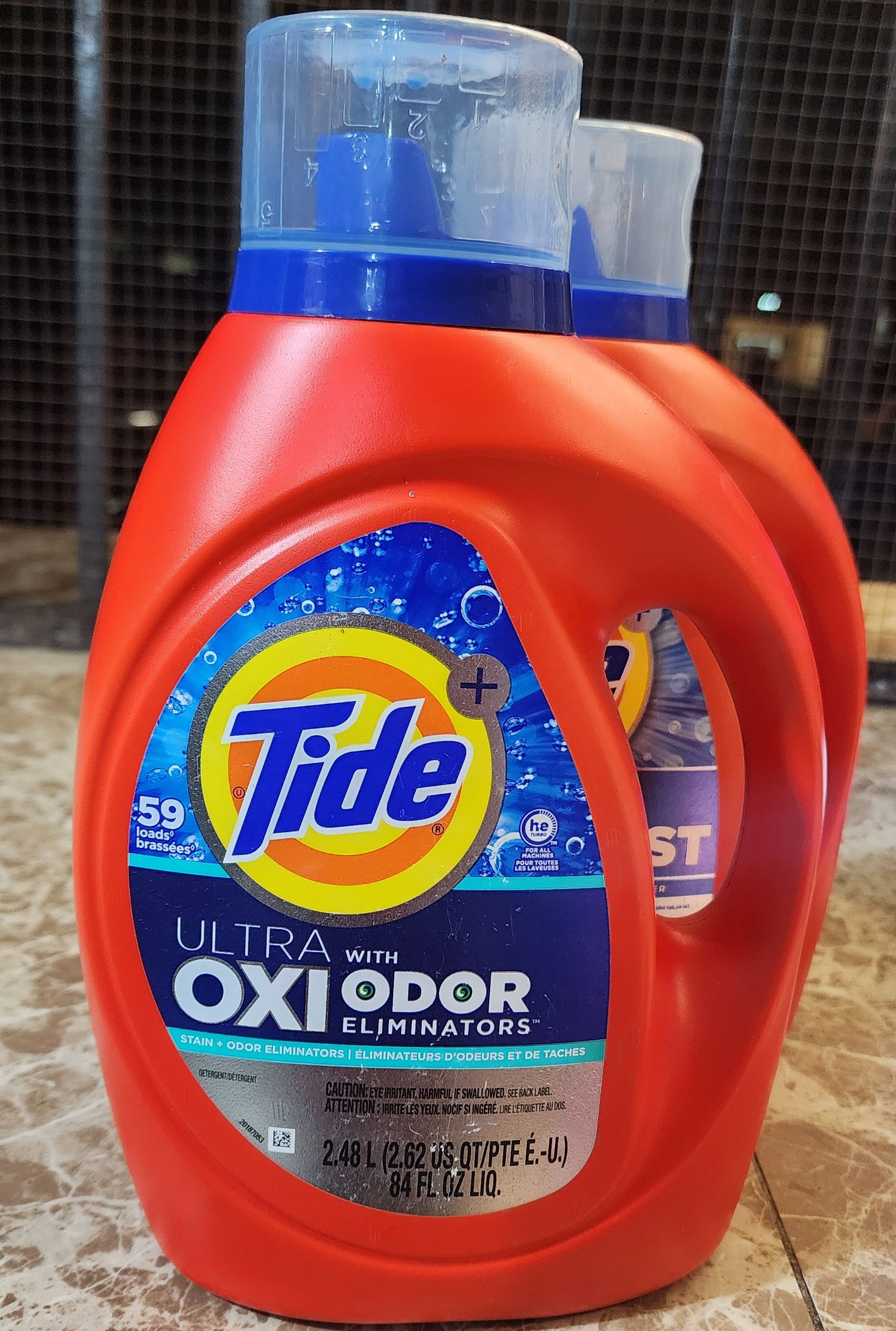 Tide ultra with oxi odor eliminator 84 oz _0