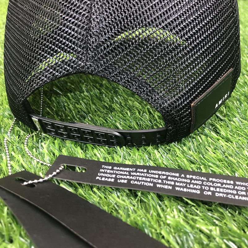 AMIRI CURVED PEAK BLACK AND YELLOW LOGO_1