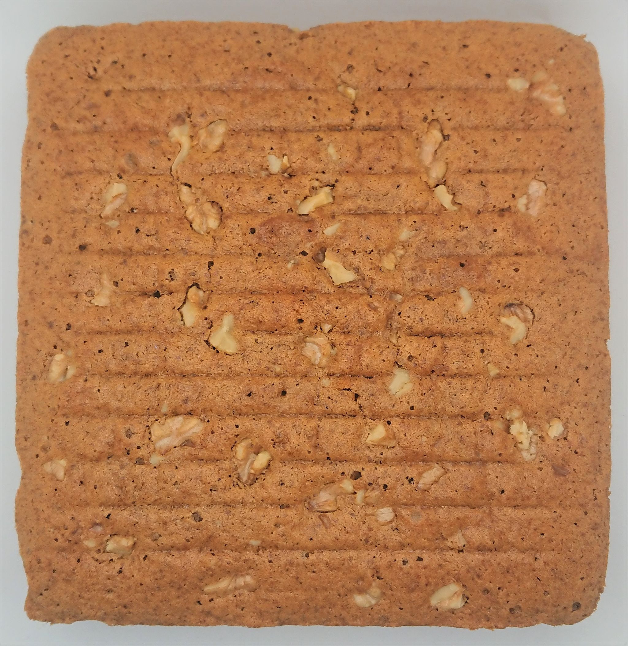 Coffee cake topped with walnuts_0