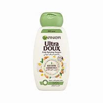 GARNIER NURTURING ALMOND MILK